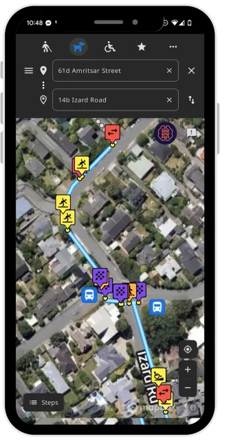 Access Quest showing a planned journey between two addresses, with a blue route line and accessibility feature markers